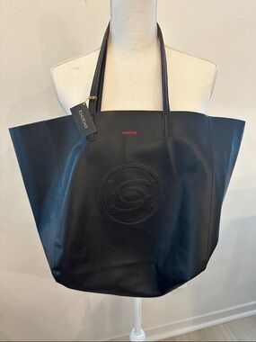 NWT Bebe Black Leather Tote with Embossed Logo